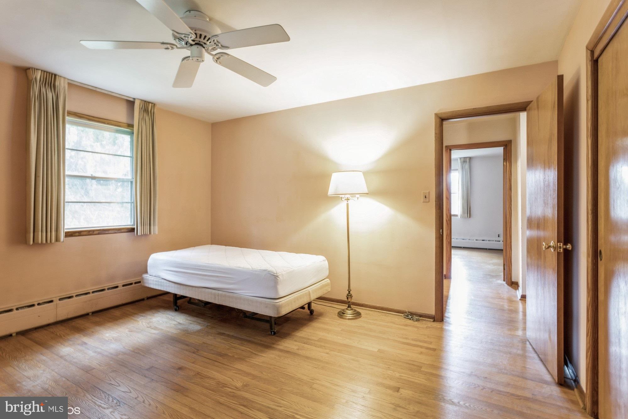 505 Whitaker Mill Road Fallston, MD 21047 - Photo 24 of 49 a bedroom with a bed and a mirror