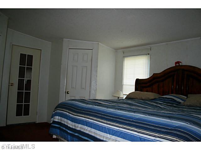 1465 Swicegood Road Linwood, NC 27299 - Photo 3 of 8 Master Bedroom.