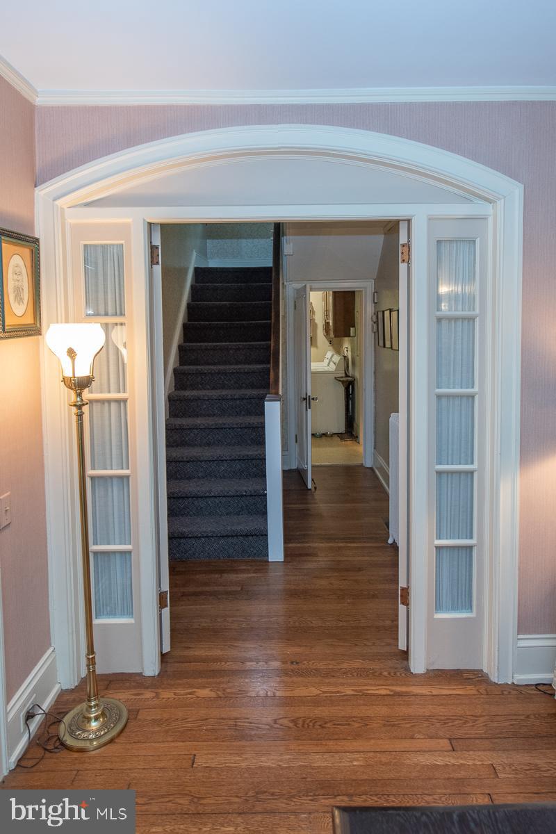 105 Llanfair Road Ardmore, PA 19003 - Photo 13 of 33 French doors from Living Room to Hall