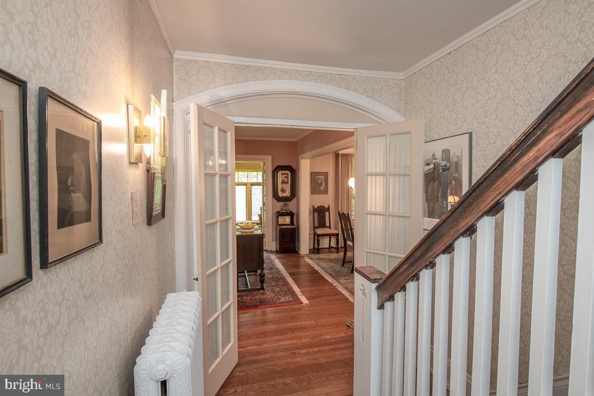 105 Llanfair Road Ardmore, PA 19003 - Photo 14 of 33 French doors from Hall to Living Room