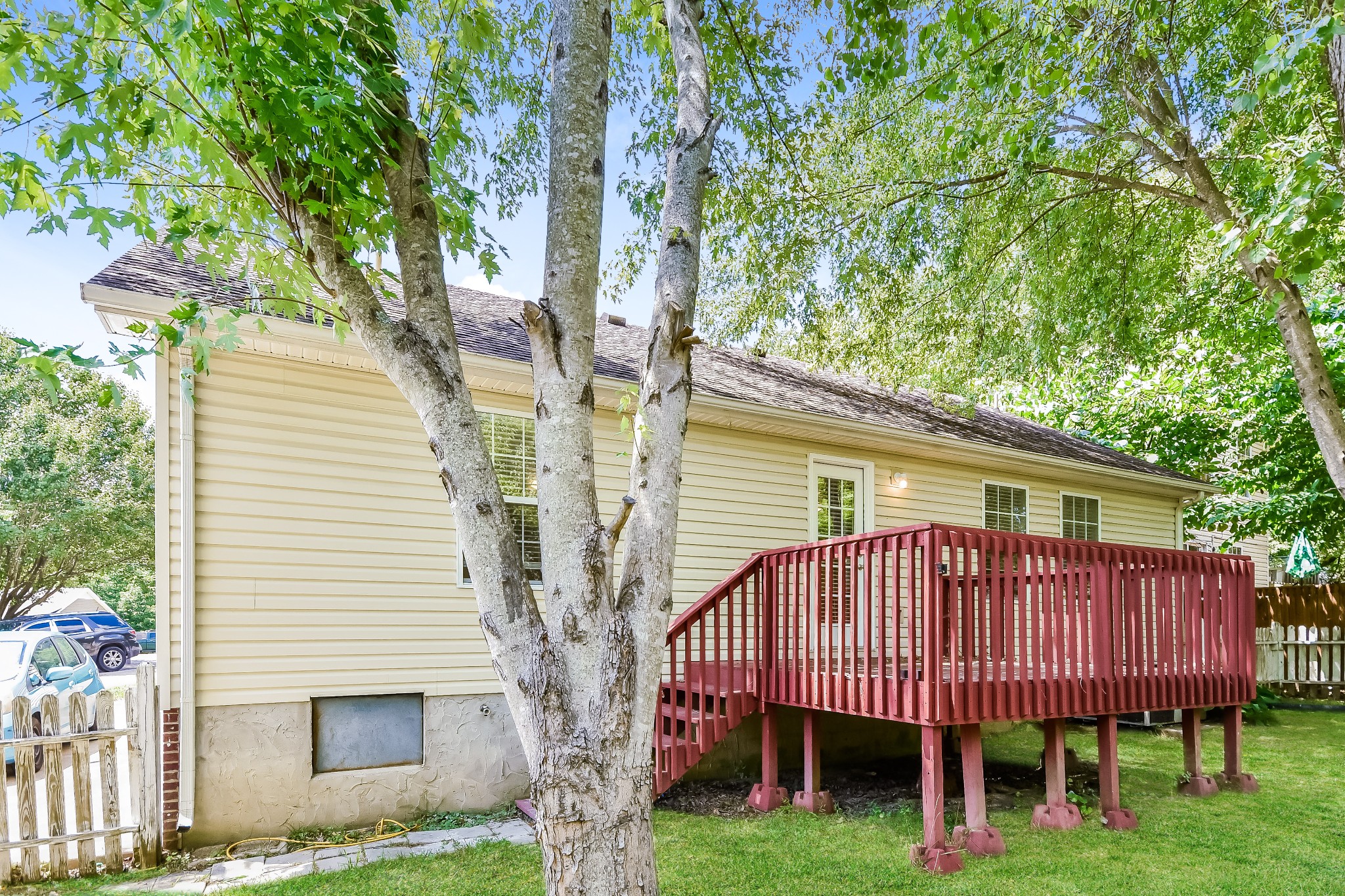 649 Laramie Drive Springfield, TN 37172 - Photo 14 of 15 a view of a house with a yard and deck