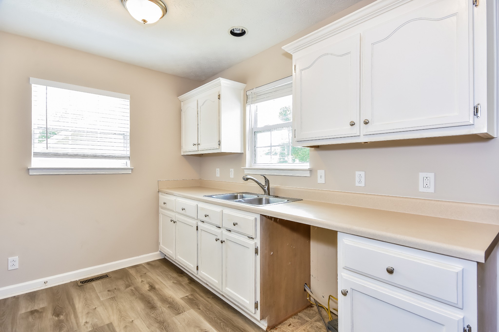 649 Laramie Drive Springfield, TN 37172 - Photo 8 of 15 a kitchen with a sink window and cabinets