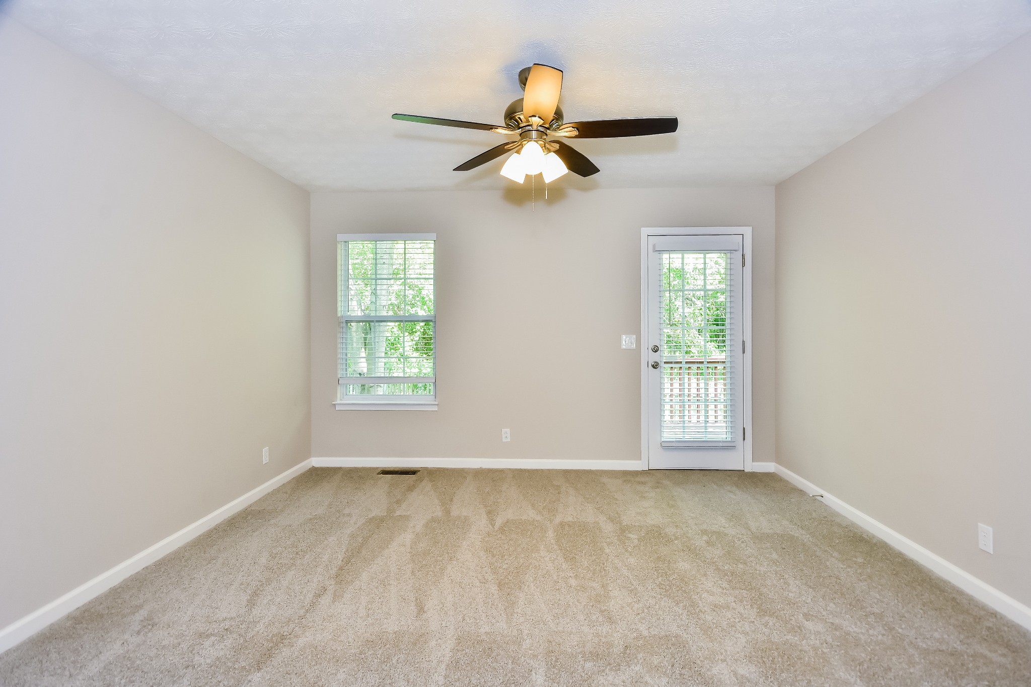 649 Laramie Drive Springfield, TN 37172 - Photo 9 of 15 wooden floor in an empty room with a window