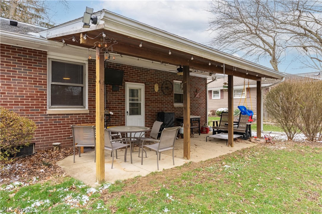 6775 Grove Road Clinton, OH 44216 - Photo 5 of 19 View of patio featuring a ceiling fan