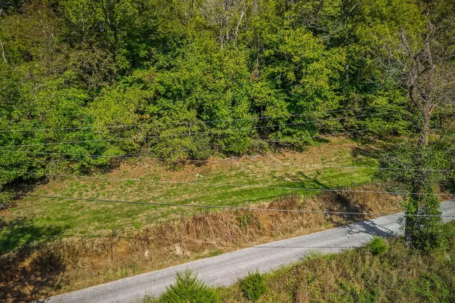 a kitchen with refrigerator cabinets and a sink