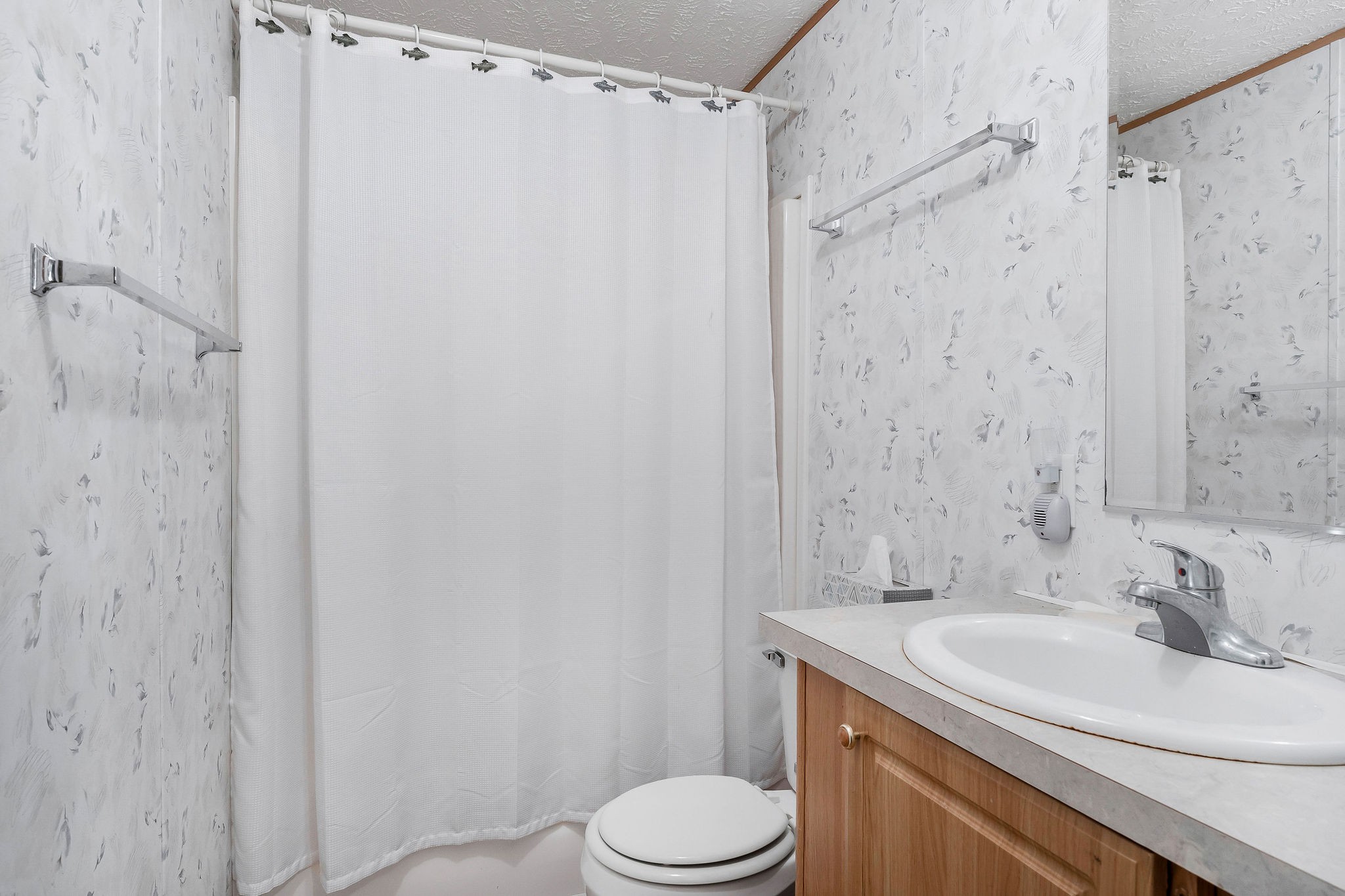 43 Moss Bend Road Lancaster, TN 38569 - Photo 24 of 75 a bathroom with a sink toilet and shower