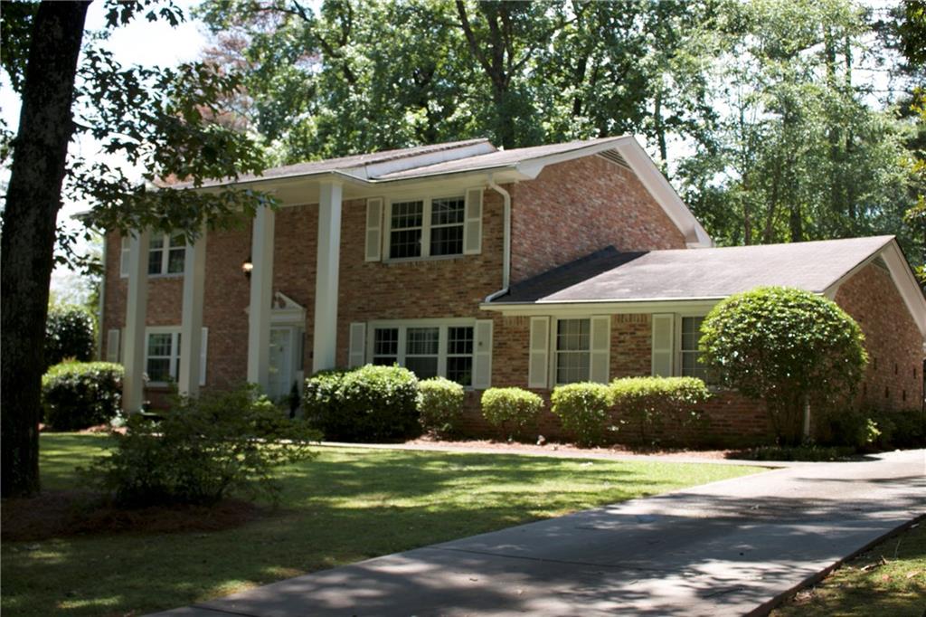 1207 Berkeley Road Avondale Estates, GA 30002 - Photo 1 of 1 a view of a house with backyard and garden