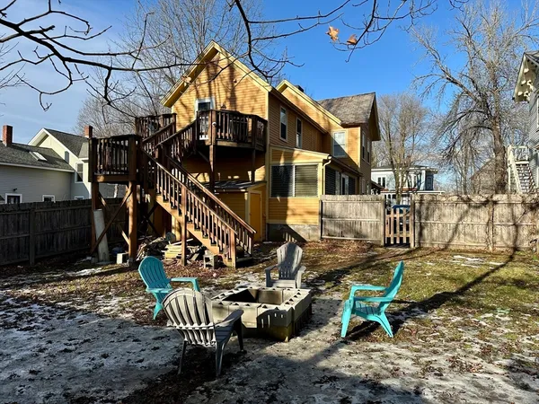 a view of a chairs and tables in the patio