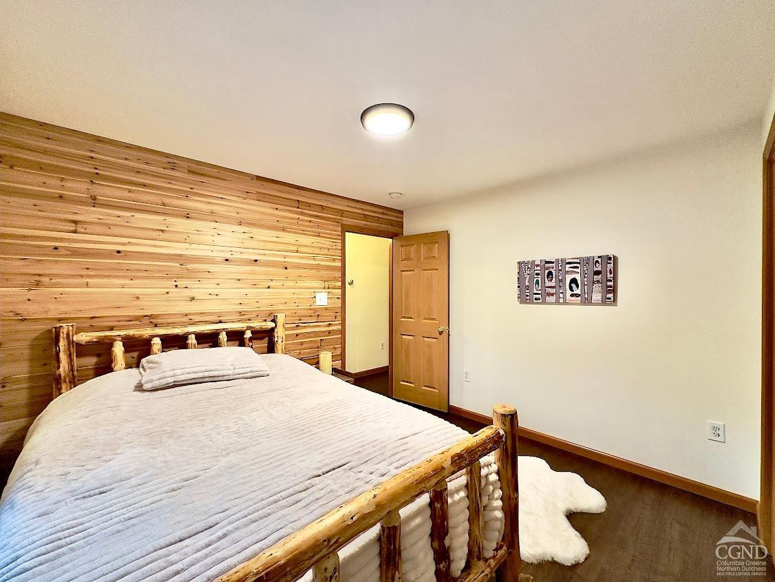 90 Cramer Road Jewett, NY 12444 - Photo 32 of 50 a bedroom with a bed and a large window