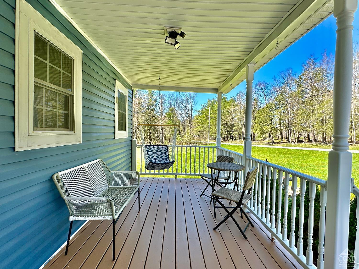90 Cramer Road Jewett, NY 12444 - Photo 45 of 50 a view of a chair and table on the deck