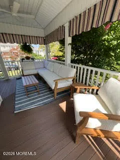 a view of swimming pool with seating area