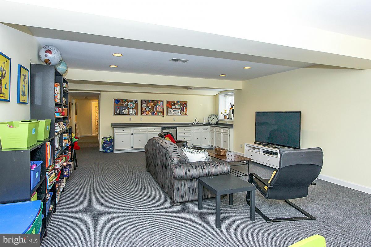 6904 Nevis Road Bethesda, MD 20817 - Photo 23 of 29 RecRm w/wet bar