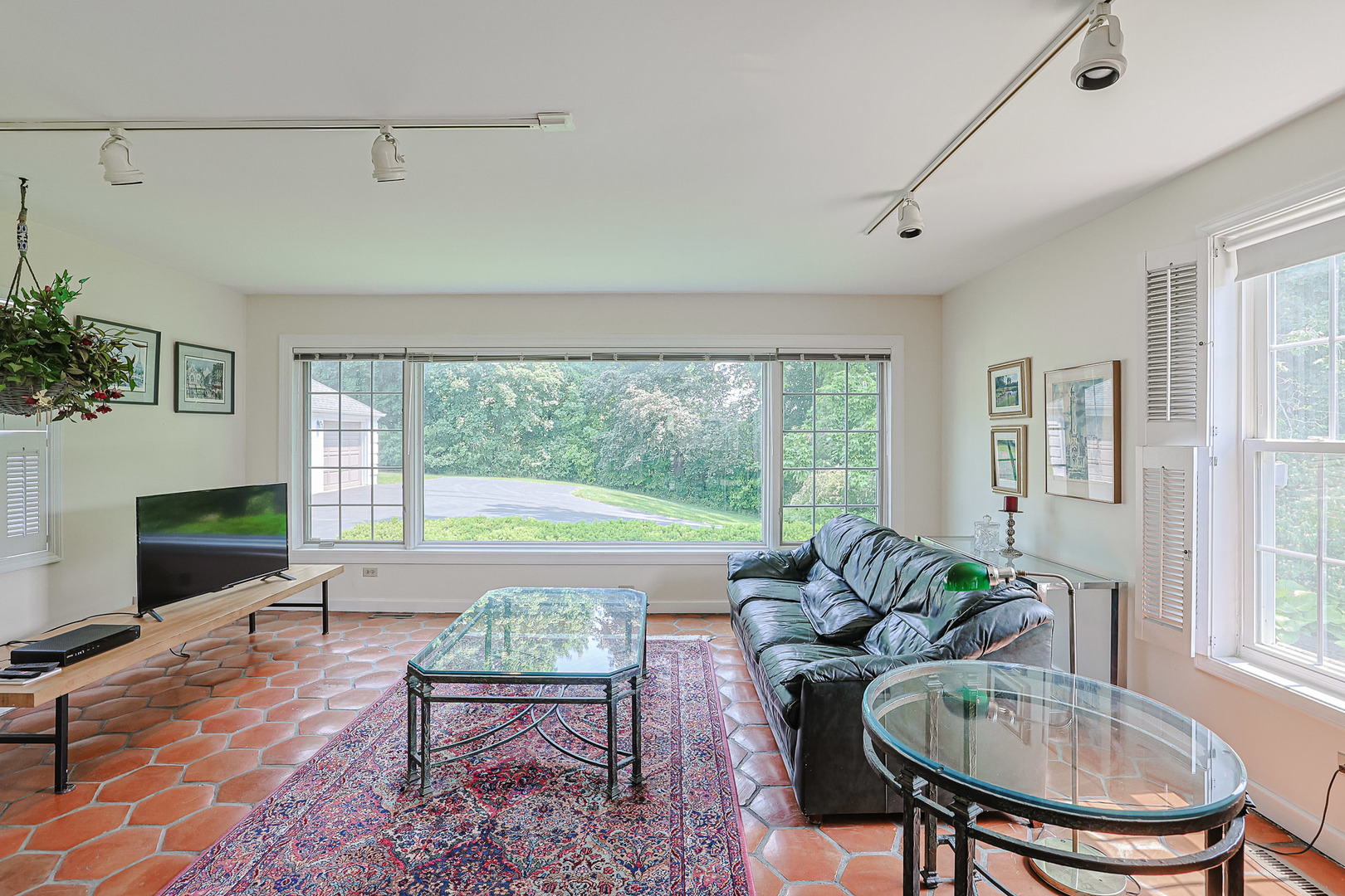 1596 West Palatine Road Inverness, IL 60067 - Photo 12 of 49 a living room with furniture a table and a large window