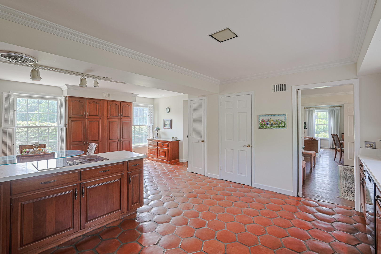 1596 West Palatine Road Inverness, IL 60067 - Photo 18 of 49 a large bathroom with a granite countertop sink a mirror and a bathtub
