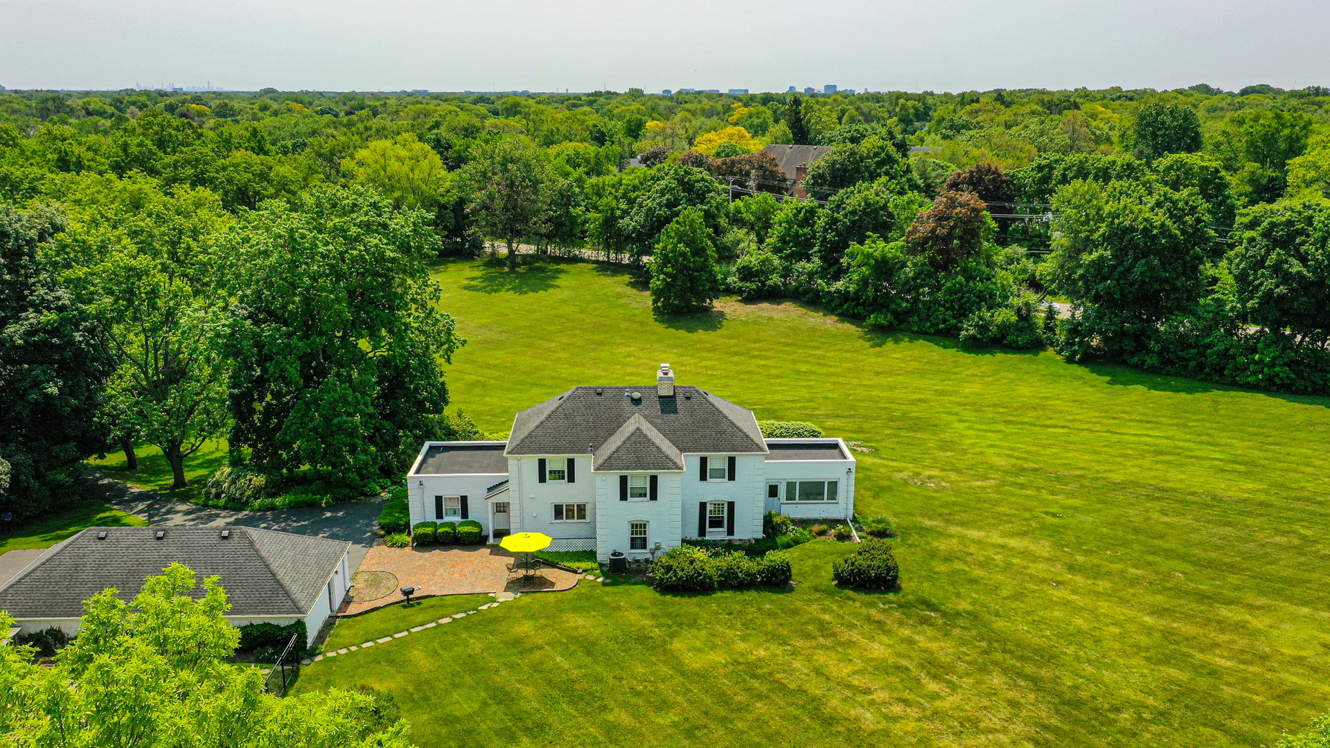 1596 West Palatine Road Inverness, IL 60067 - Photo 2 of 49 a view of a house with a big yard