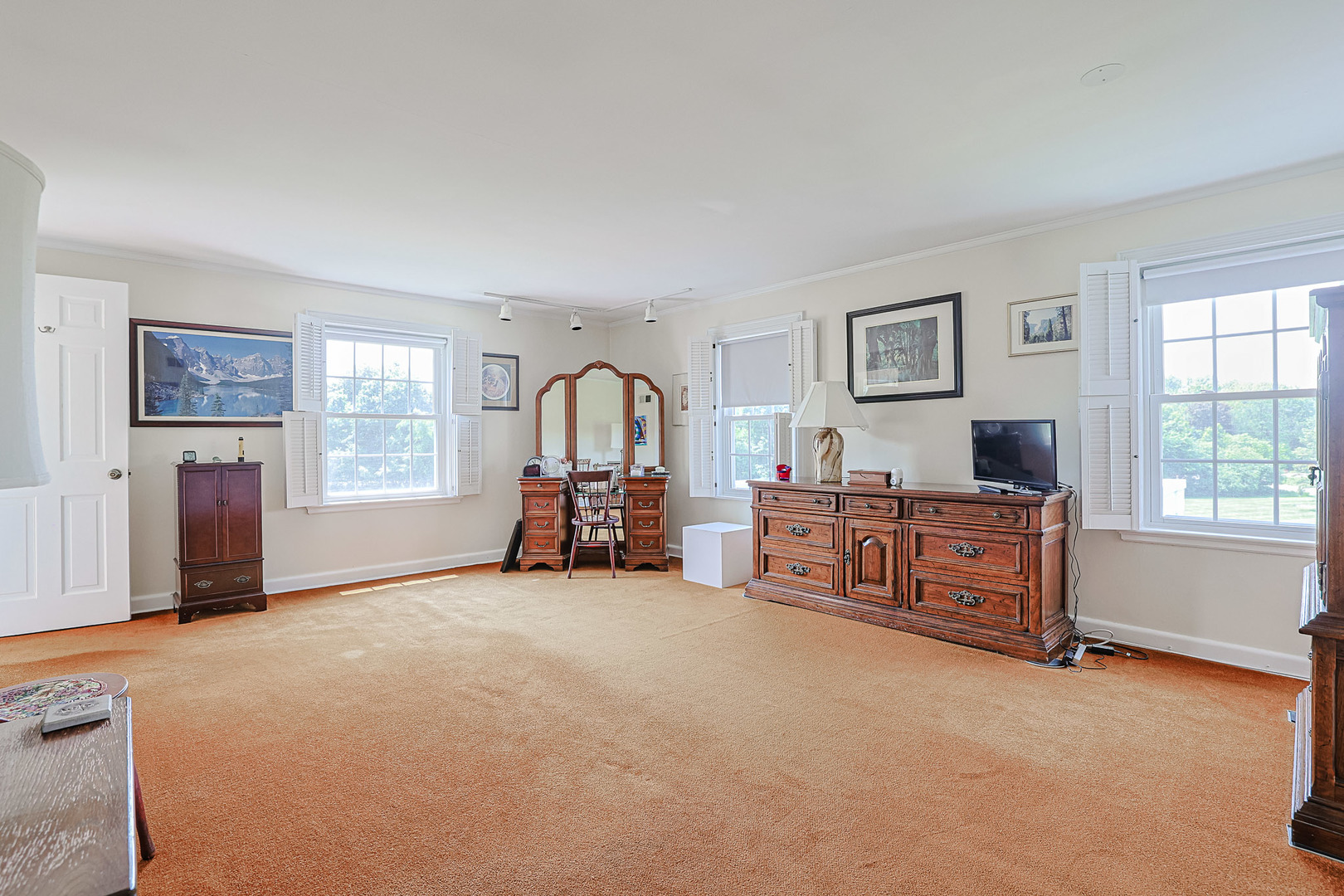 1596 West Palatine Road Inverness, IL 60067 - Photo 26 of 49 a bed room with furniture and a window