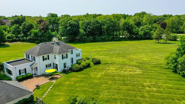 a view of a house with a big yard