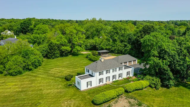a view of a house with a big yard