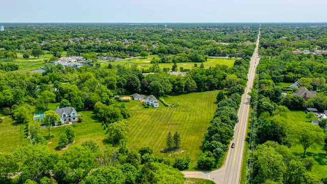 a view of a garden with a lake