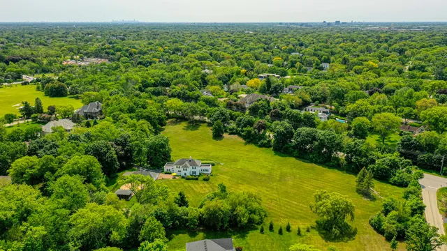 a view of a lake with a building in the background