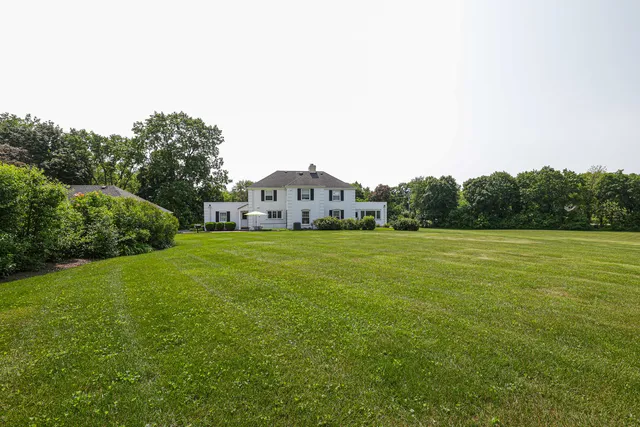 a house view with a garden space