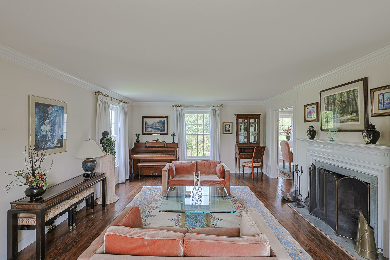 1596 West Palatine Road Inverness, IL 60067 - Photo 9 of 49 a living room with furniture fireplace and flat screen tv