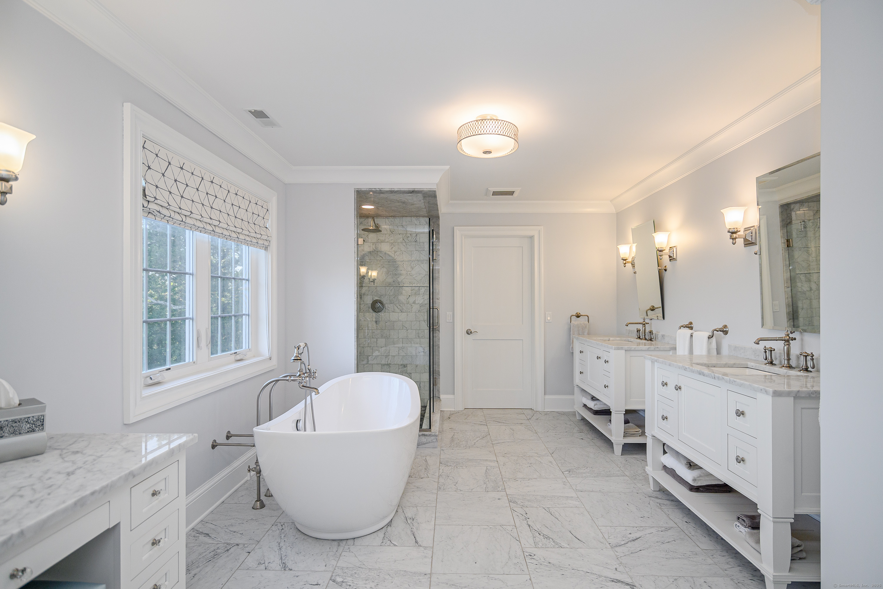 6 A Rock Ridge Court New Fairfield, CT 06812 - Photo 15 of 40 a bathroom with a granite countertop sink mirror bathtub and toilet