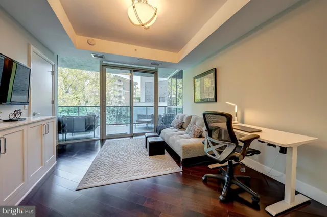 a swimming pool with outdoor seating and yard