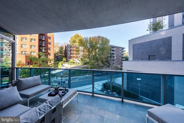 a kitchen with a table and chairs in it