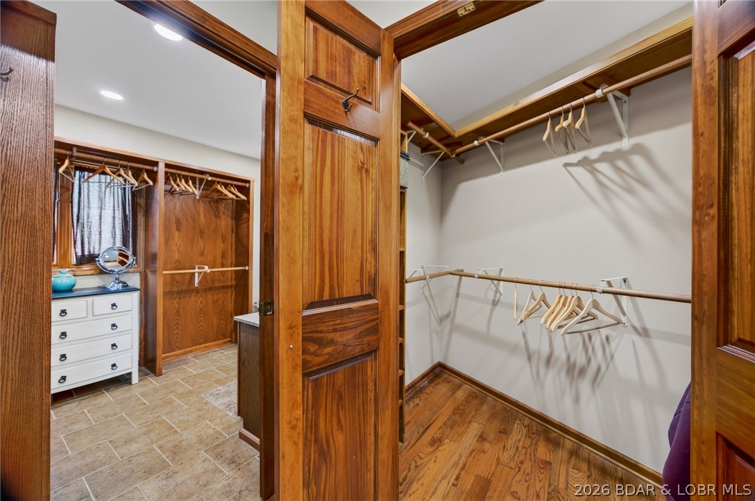 2293 Standing Rock Road Camdenton, MO 65020 - Photo 44 of 99 View into Both the His & Her's Walk-in Closets Loc