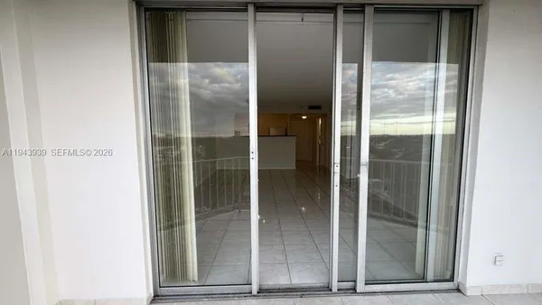 a bathroom with a glass door