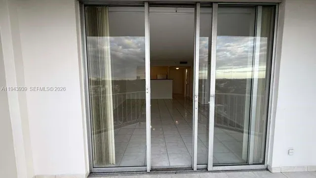 a bathroom with a glass door