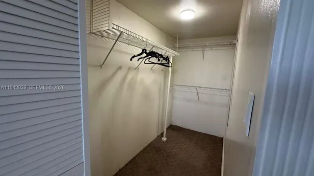 a view of a walk in closet