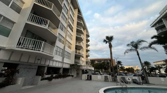 a view of a street with cars