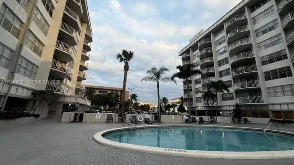 a view of tall building with outdoor space