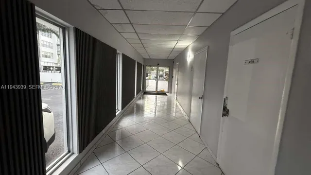 a view of an entryway with a livingroom