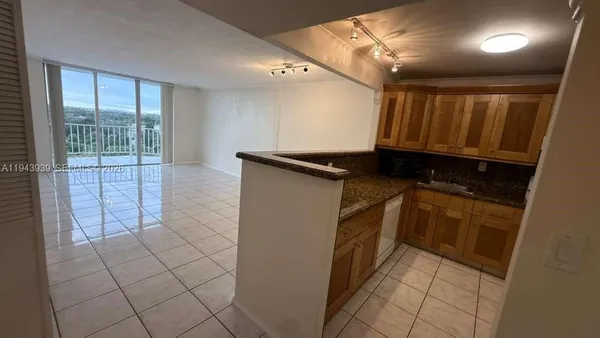 a utility room with cabinets