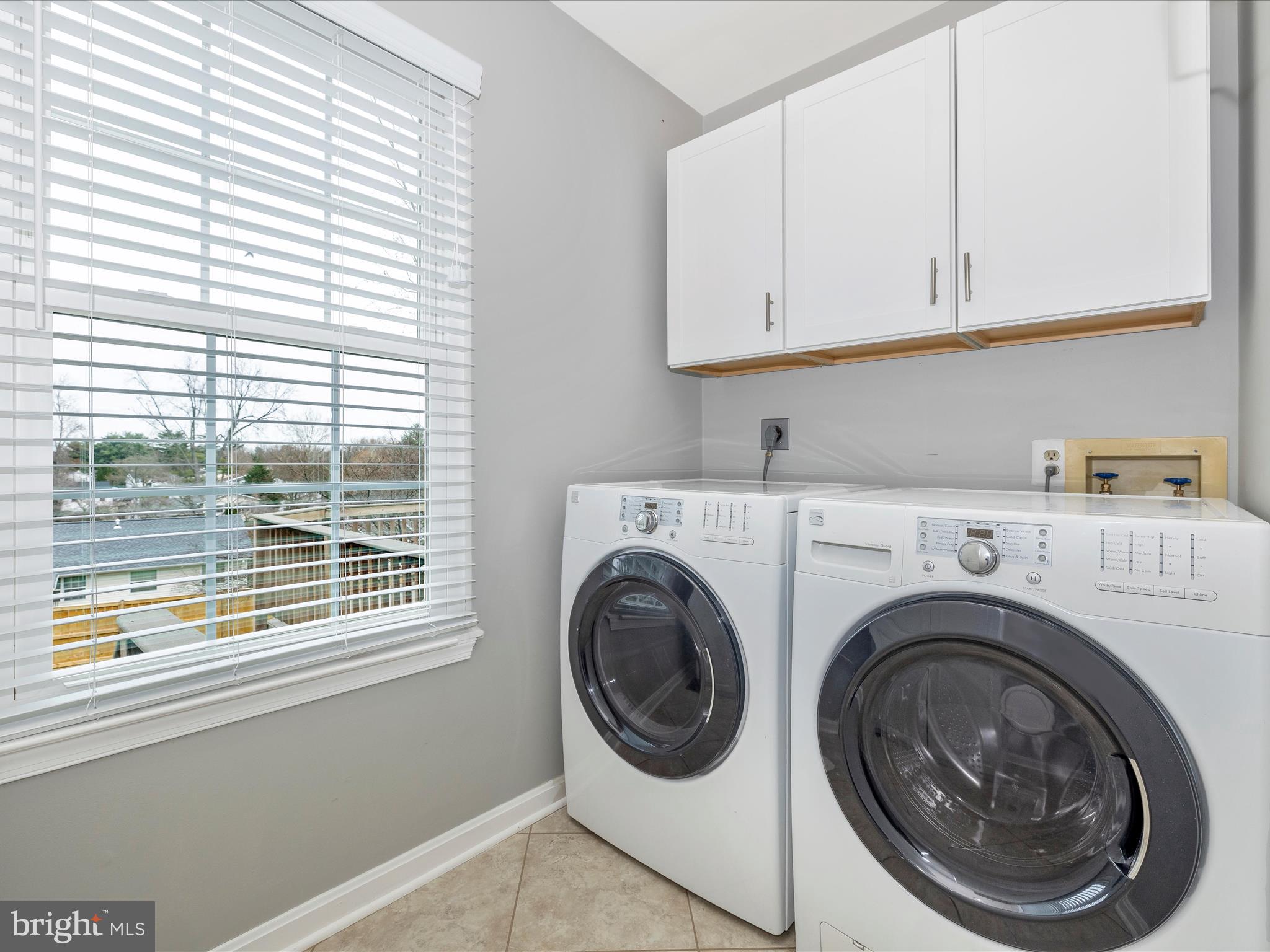 24217 Welsh Road Gaithersburg, MD 20882 - Photo 21 of 65 Laundry Room with storage cabinets on main level