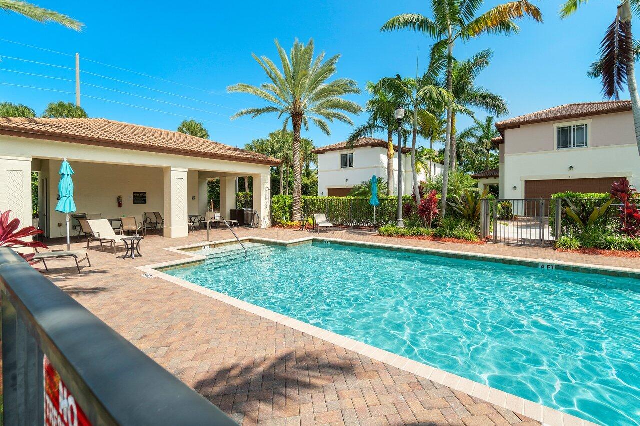 48 Northwest Hawthorne Place Boca Raton, FL 33432 - Photo 35 of 35 Community Pool and Clubhouse