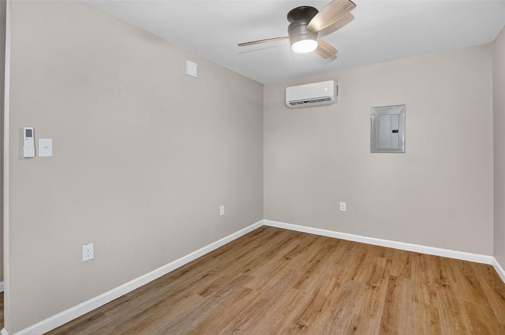 9256 Apt 300 S Fm 51 Boyd, TX 76023 - Photo 11 of 12 wooden floor in an empty room
