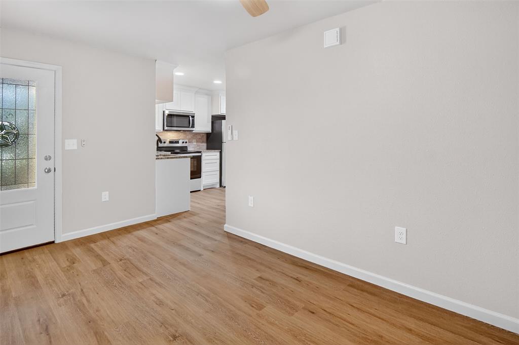 9256 Apt 300 S Fm 51 Boyd, TX 76023 - Photo 12 of 12 a view of kitchen and wooden floor