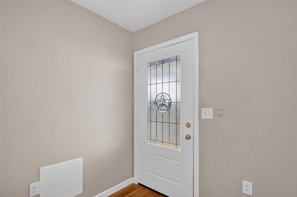 9256 Apt 300 S Fm 51 Boyd, TX 76023 - Photo 6 of 12 a view of entryway with wooden floor