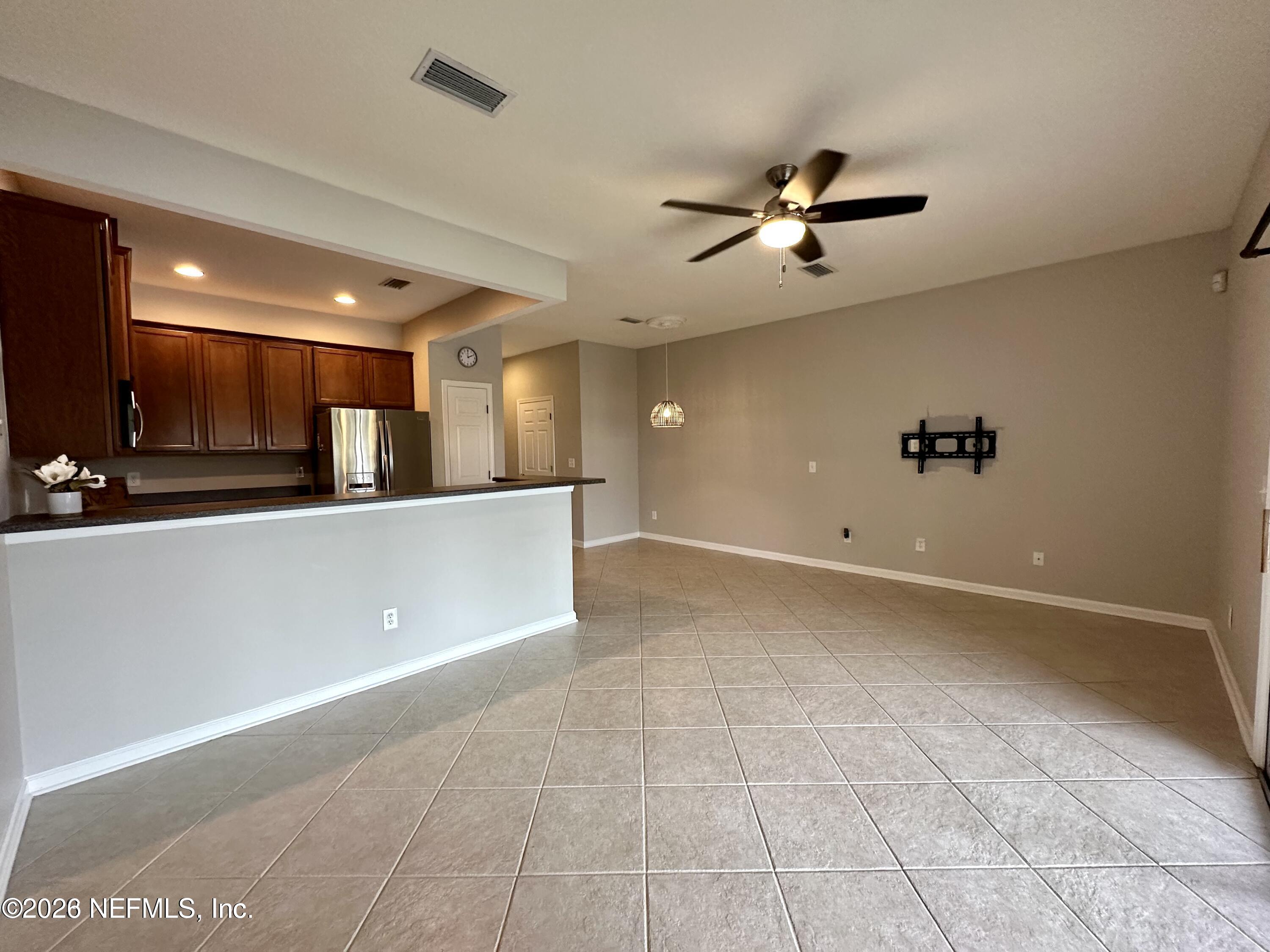 12946 Spring Rain Road Jacksonville, FL 32258 - Photo 12 of 25 LIVING ROOM