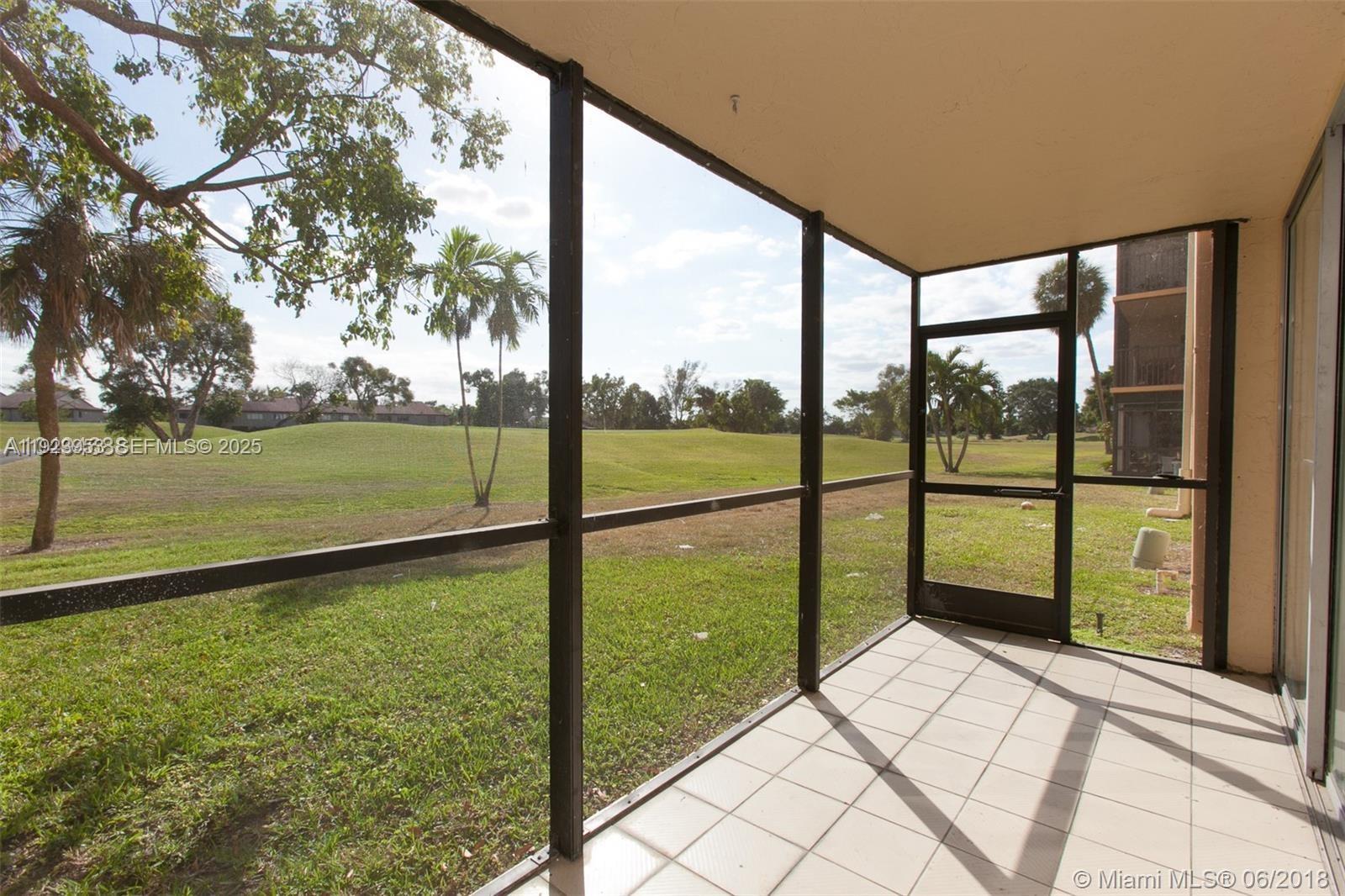 3821 Environ Boulevard, Unit 107 Lauderhill, FL 33319 - Photo 13 of 19 a view of ocean from a yard