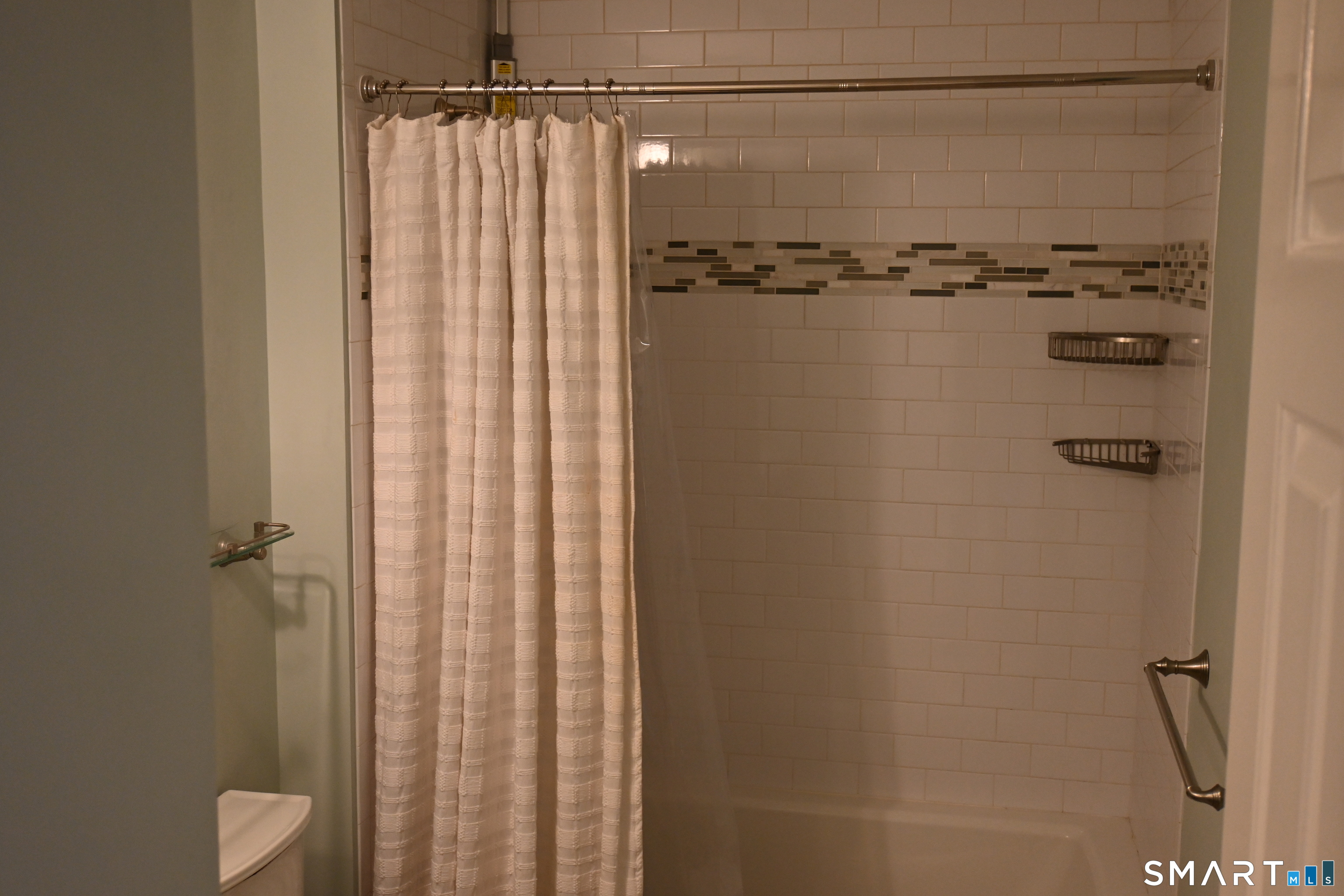 9 River Road, Unit 418 Greenwich, CT 06807 - Photo 11 of 38 a bathroom with a shower
