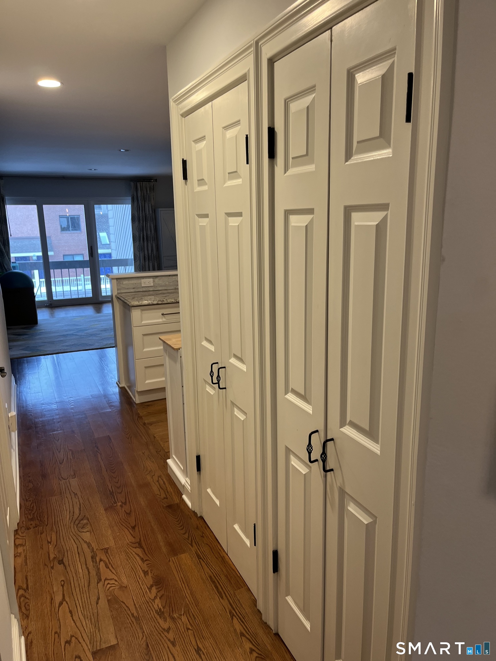 9 River Road, Unit 418 Greenwich, CT 06807 - Photo 13 of 38 a view of a hallway with wooden floor