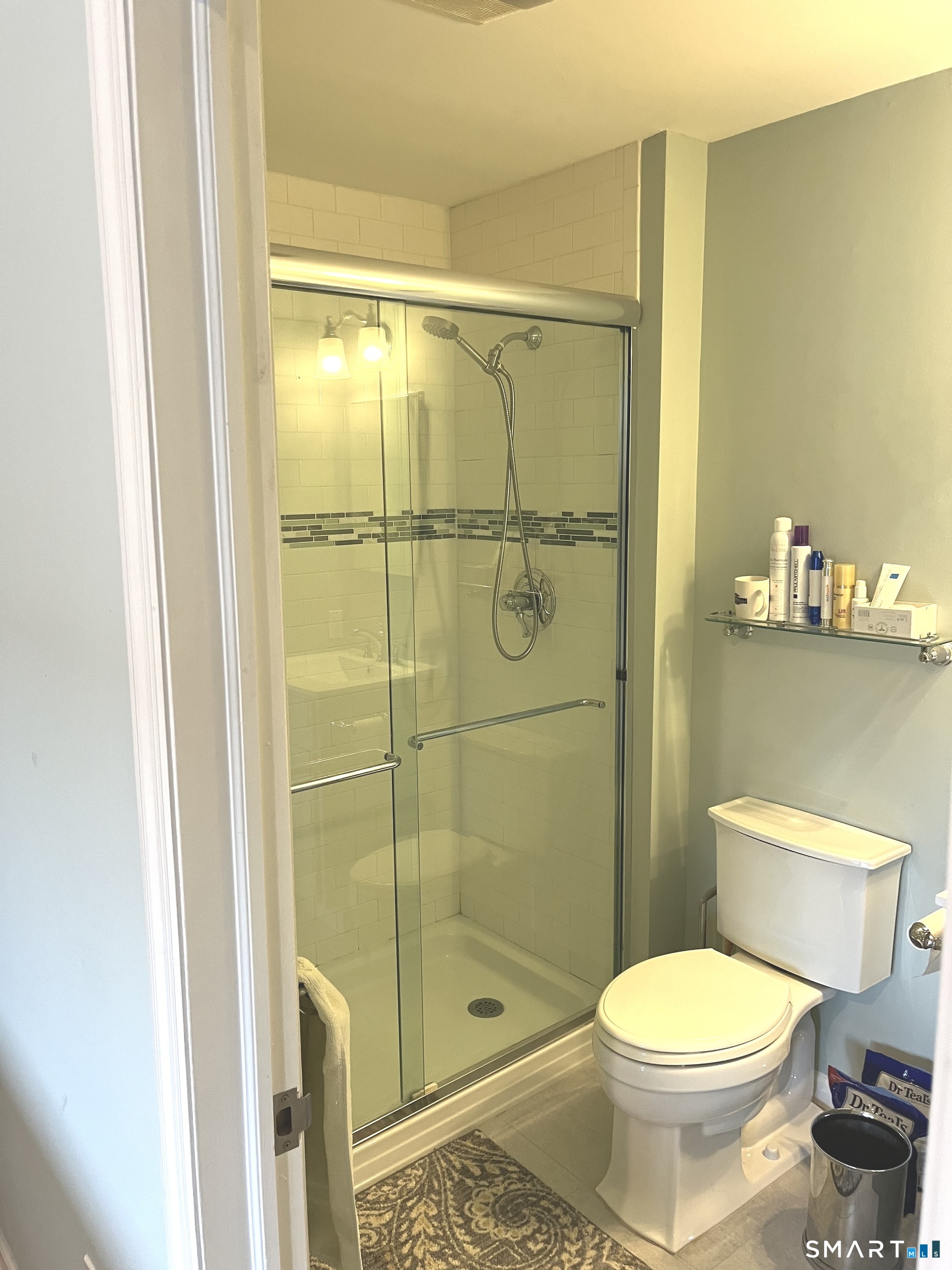 9 River Road, Unit 418 Greenwich, CT 06807 - Photo 25 of 38 a bathroom with a toilet and a shower