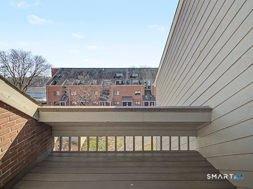 9 River Road, Unit 418 Greenwich, CT 06807 - Photo 32 of 38 a view of a balcony