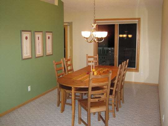 1580 South Meridian Road Rockford, IL 61102 - Photo 3 of 11 a view of a dining room with furniture and chandelier