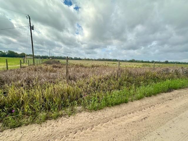 Southwest 80th Street Trenton, FL 32693 - Photo 11 of 11 a view of a lake with a big yard